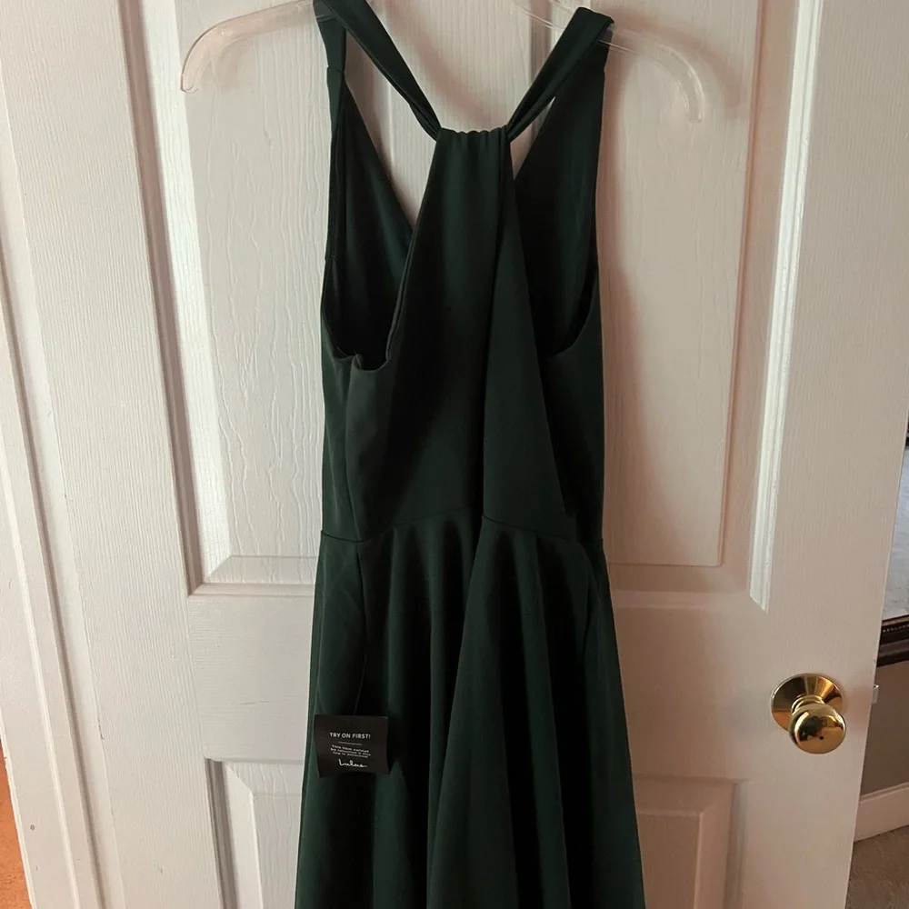 Wonder Whirl Dark Green Twist Back Skater
Dress from Lulus - Picture 4 of 6